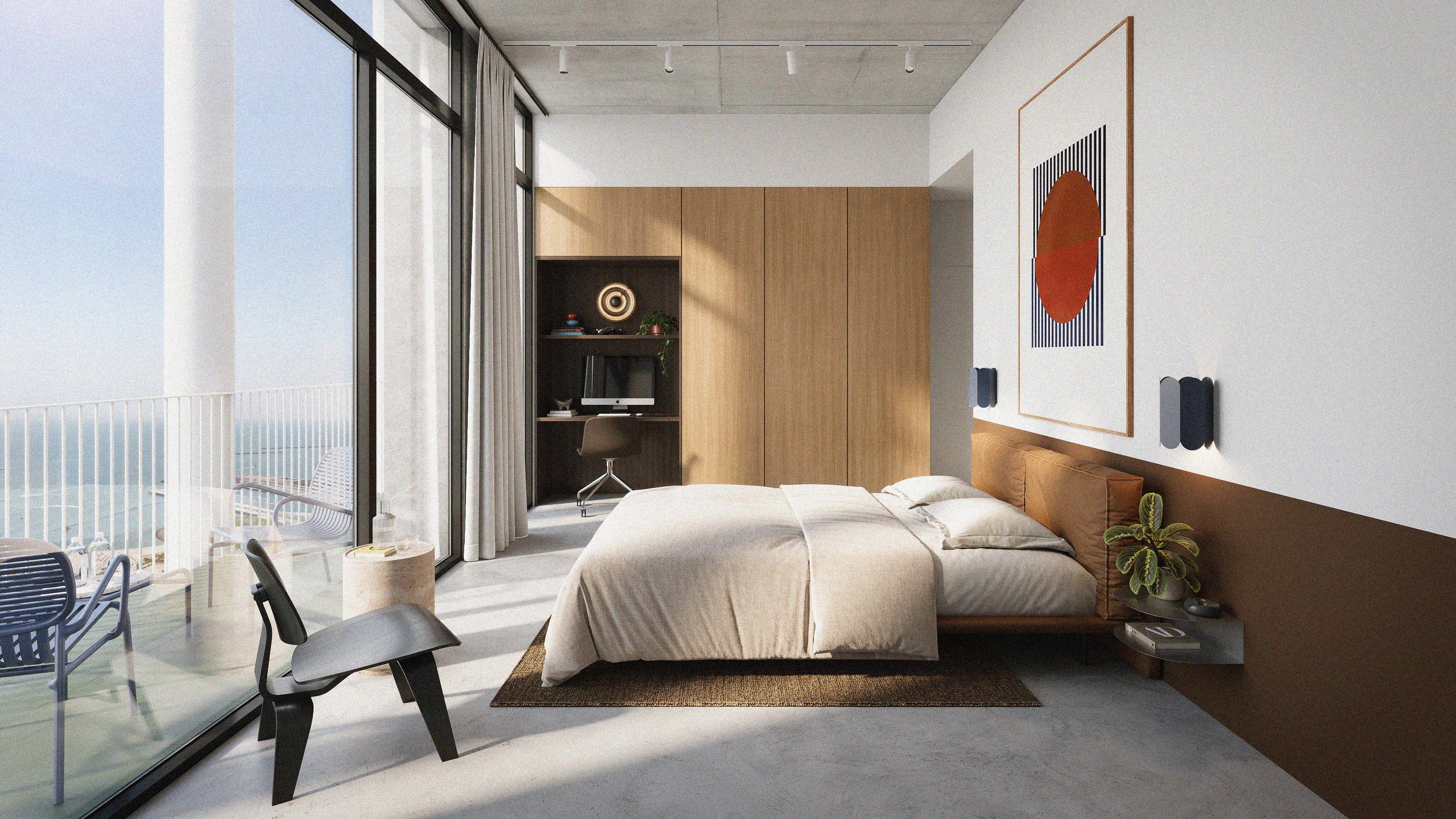 Modern hotel lobby with comfortable seating, decorative shelves, a large beige sofa, and a reception desk with the sign 'OLAIA' in the background.
